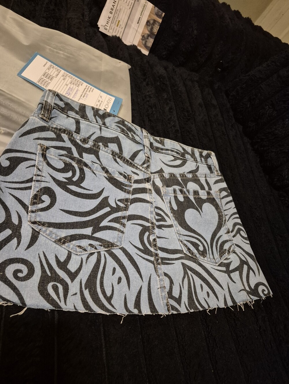 Light Blue Printed Denim Mini Skirt with Black Graphic Design